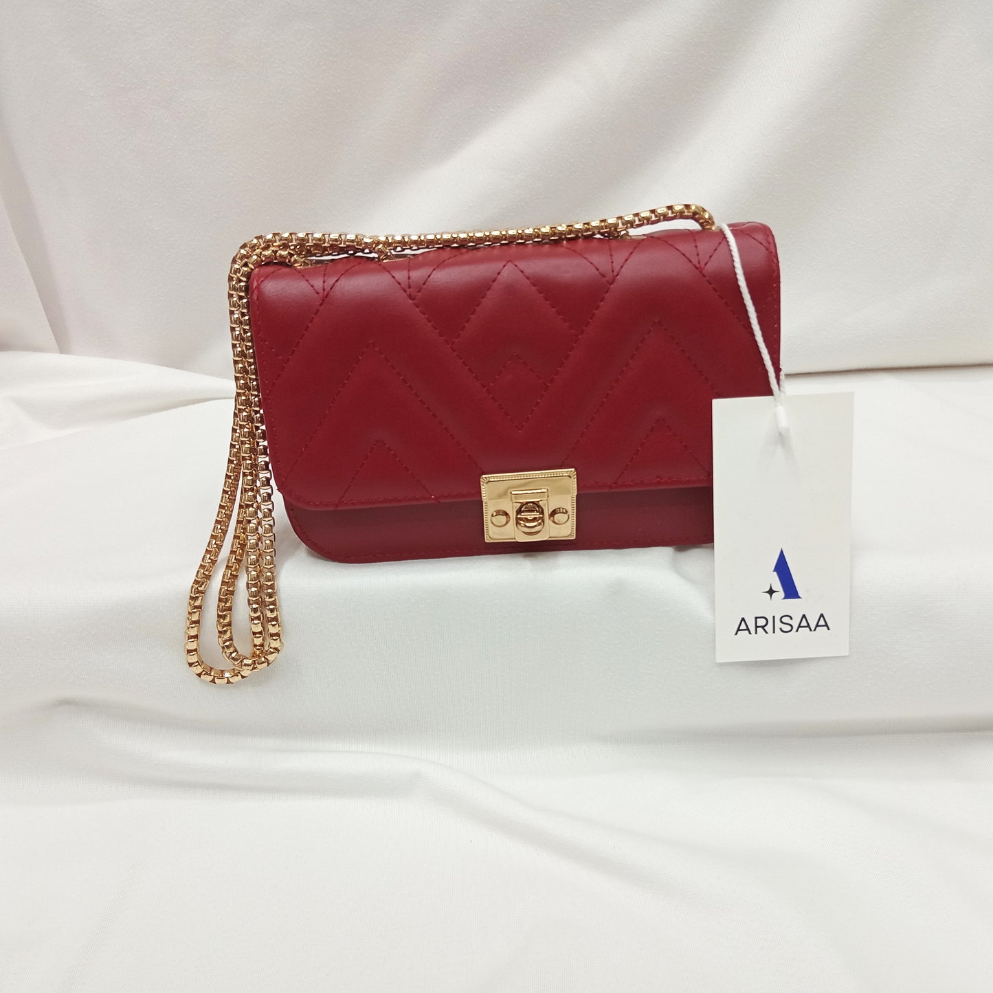 Red colour fancy purse with gold chain