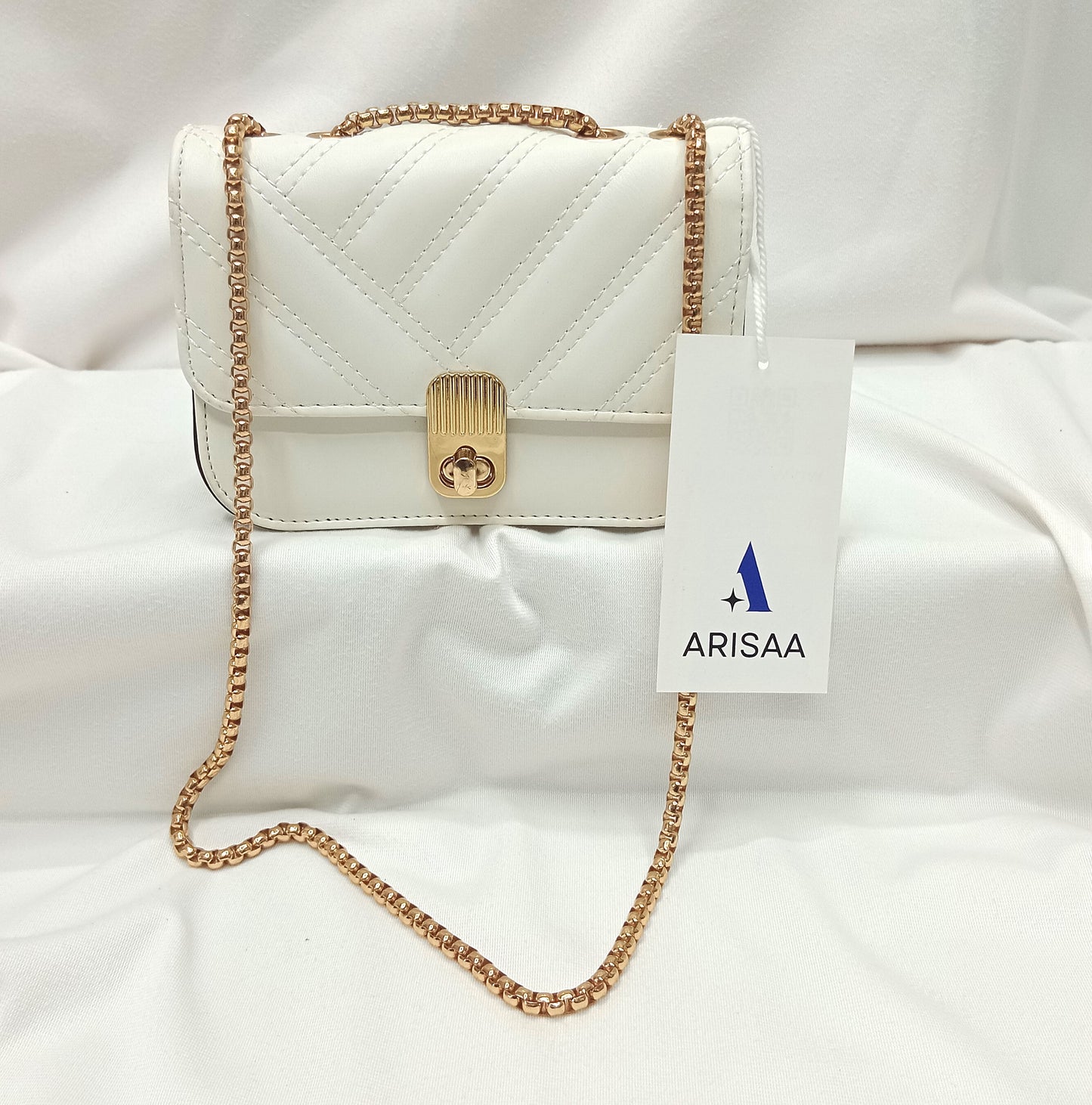 Fancy white purse with gold chain