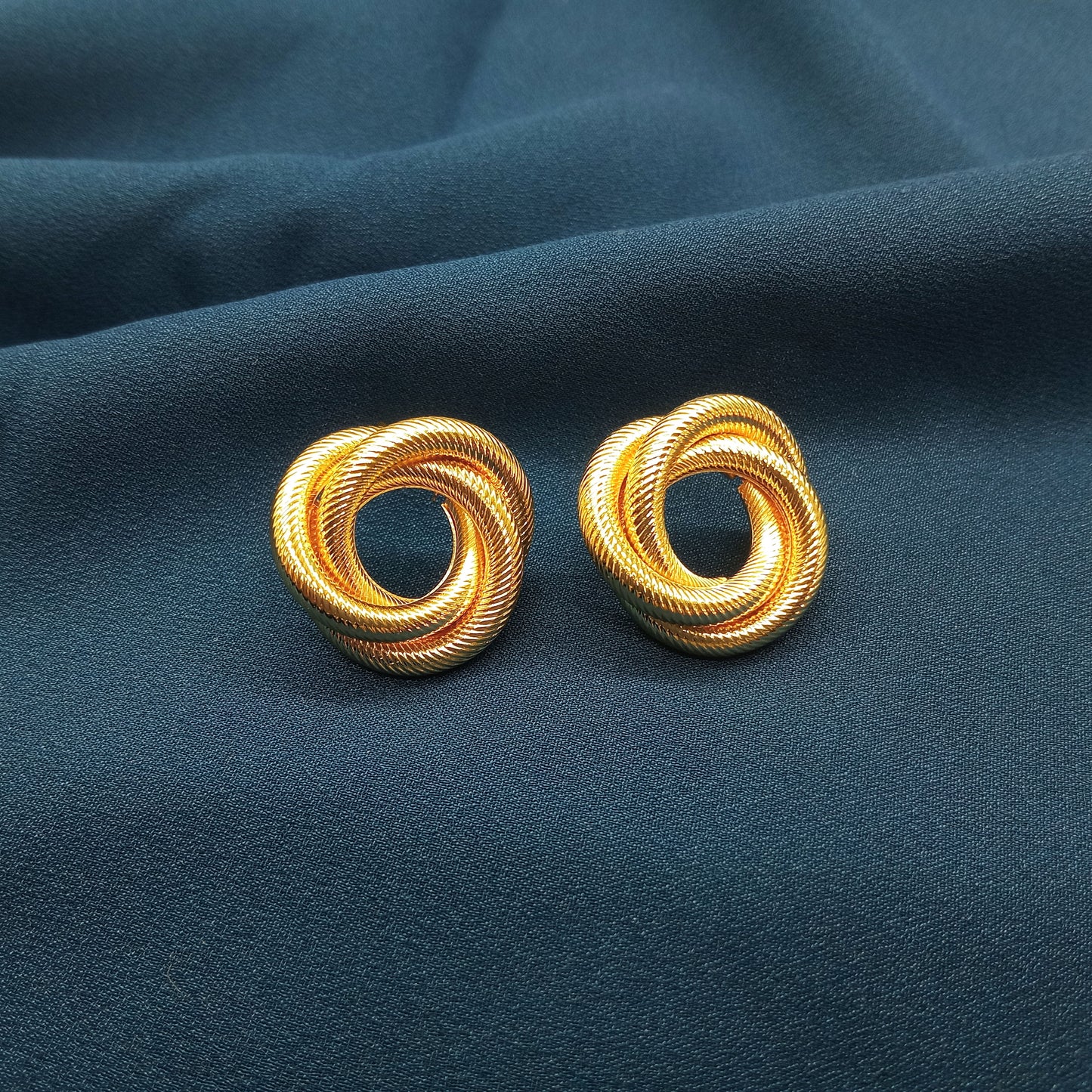 Small gold twist stud earring