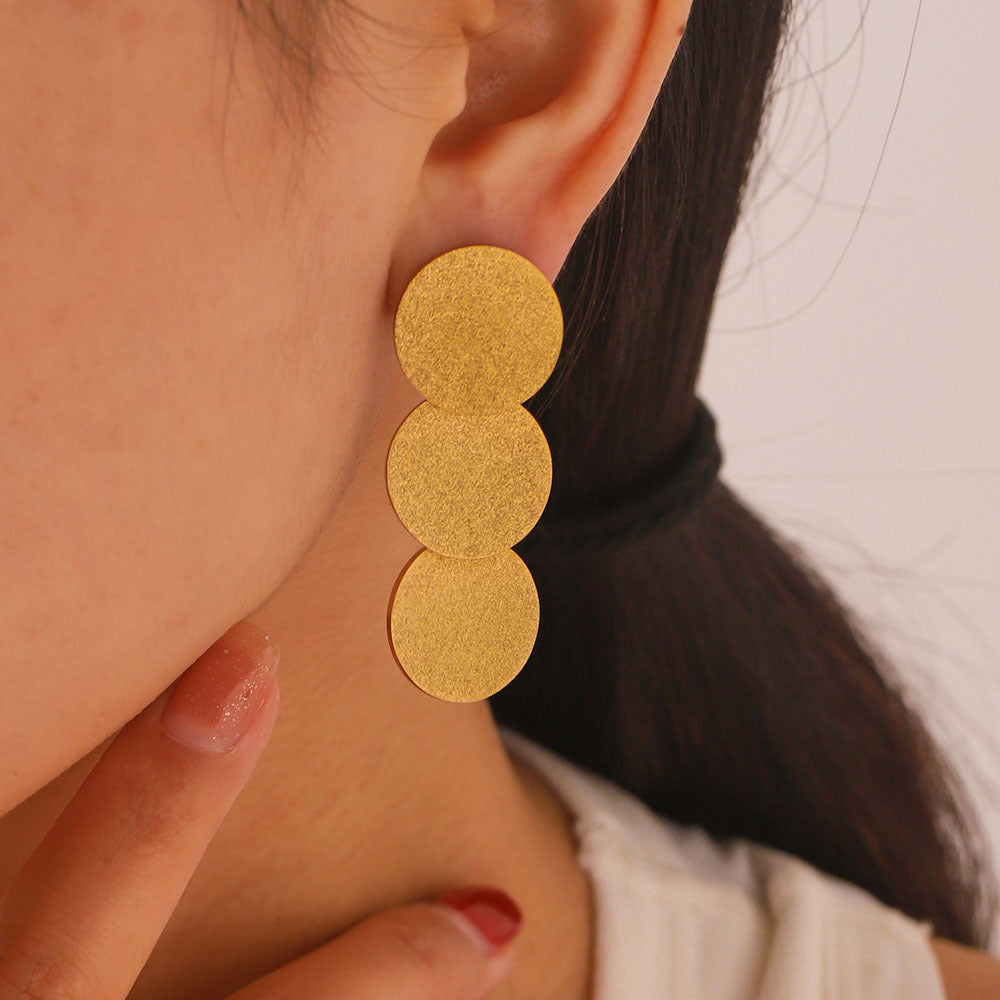 Three small circle golden dangle earring