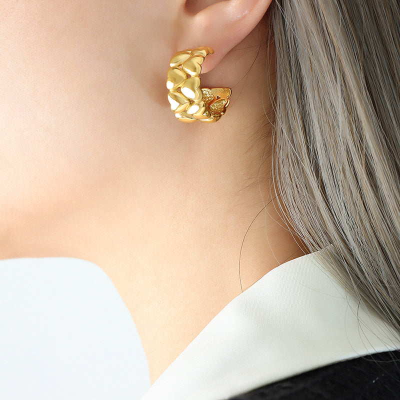 Twist heart funky gold earring