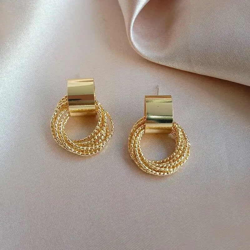 Multi layer ring golden stud earring