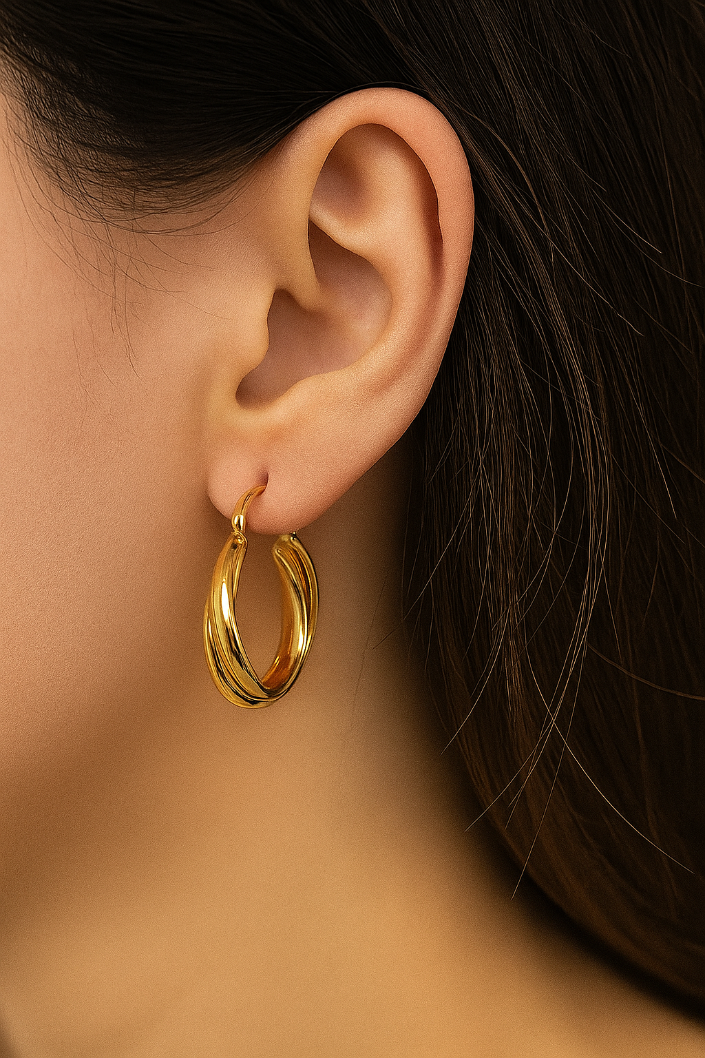 Chunky twisted gold earring