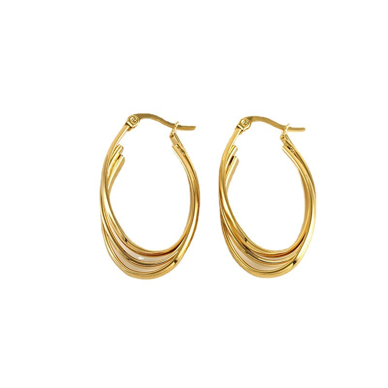 Chunky twisted gold earring