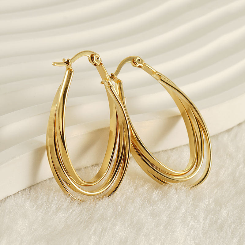 Chunky twisted gold earring