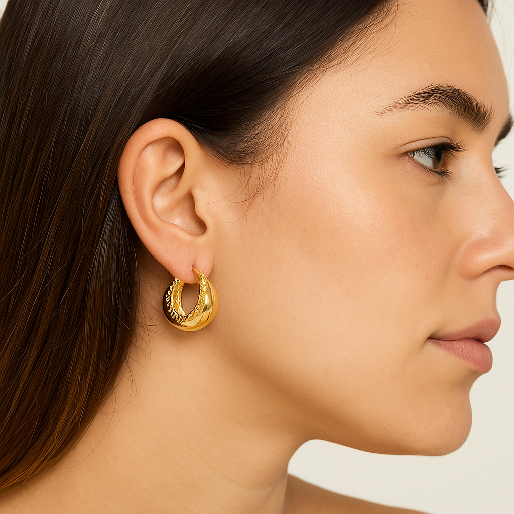 Glossy gold hoop earring