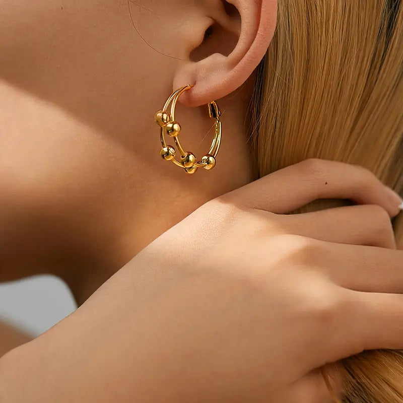 Gold round line with beads earring