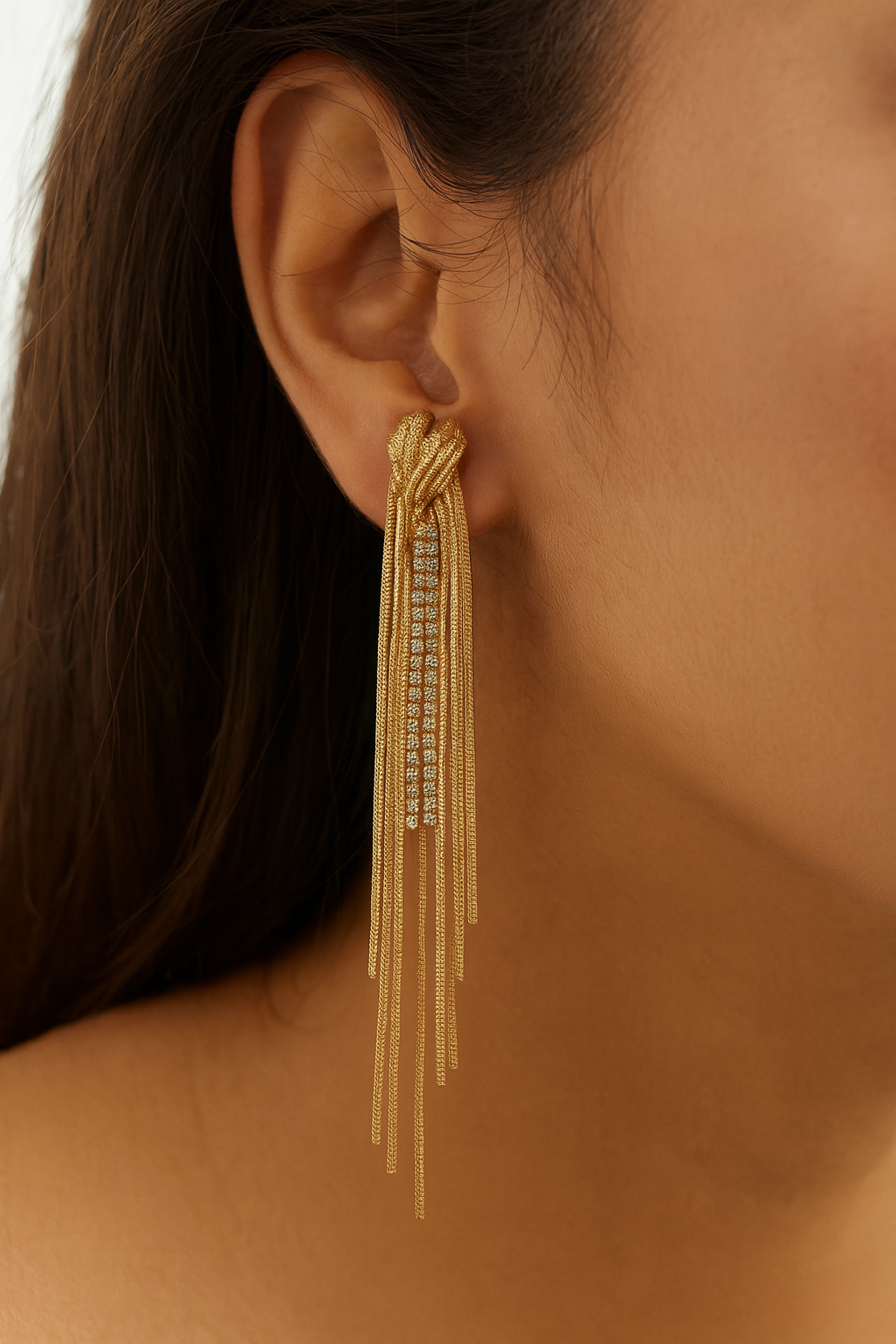 Elegant knot style golden tassel earring