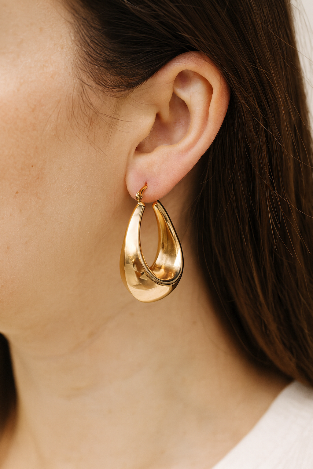 Beautiful drop style huggie earring