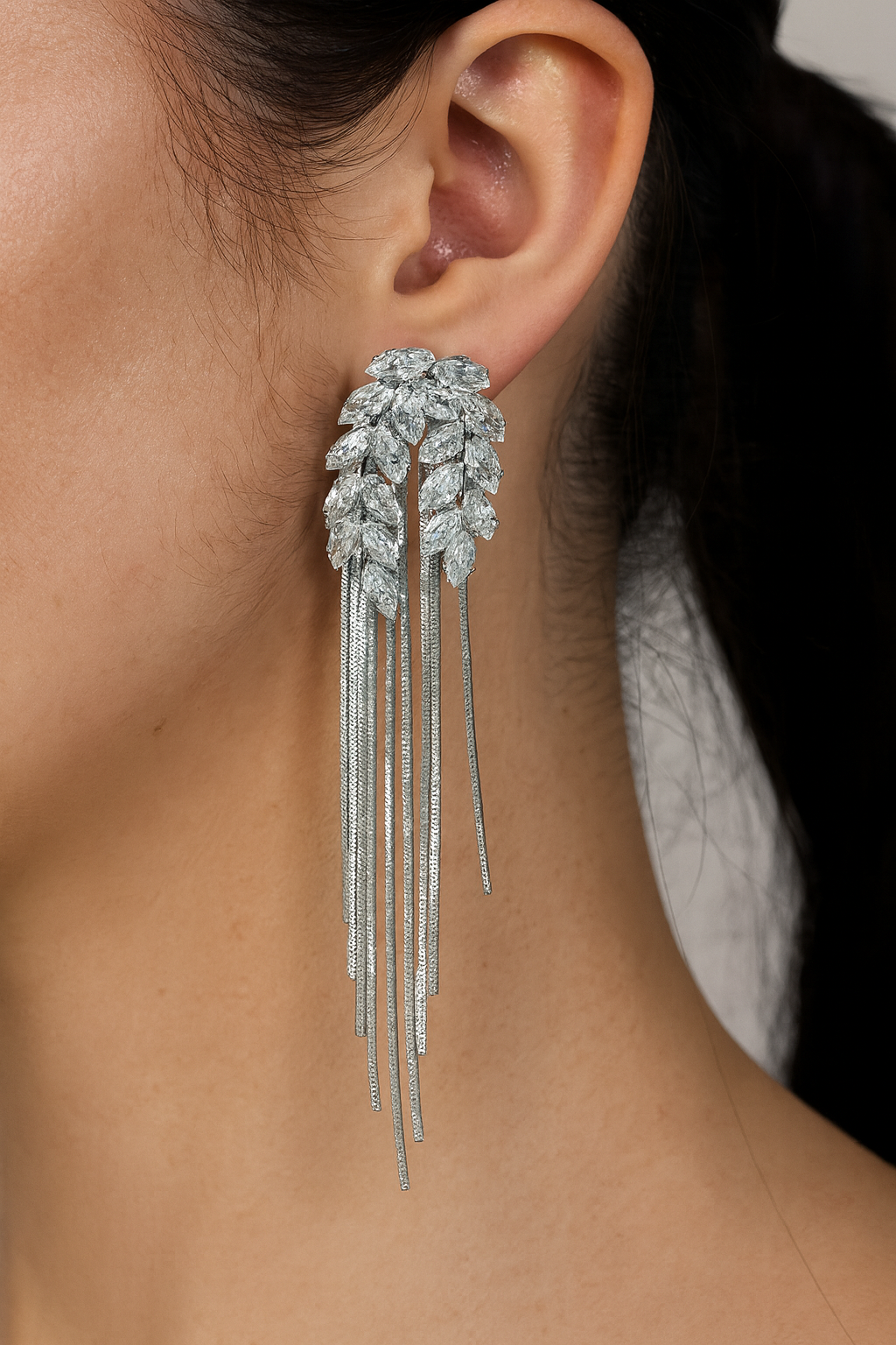 Elegant diamond leaf with tassel silver stud earring