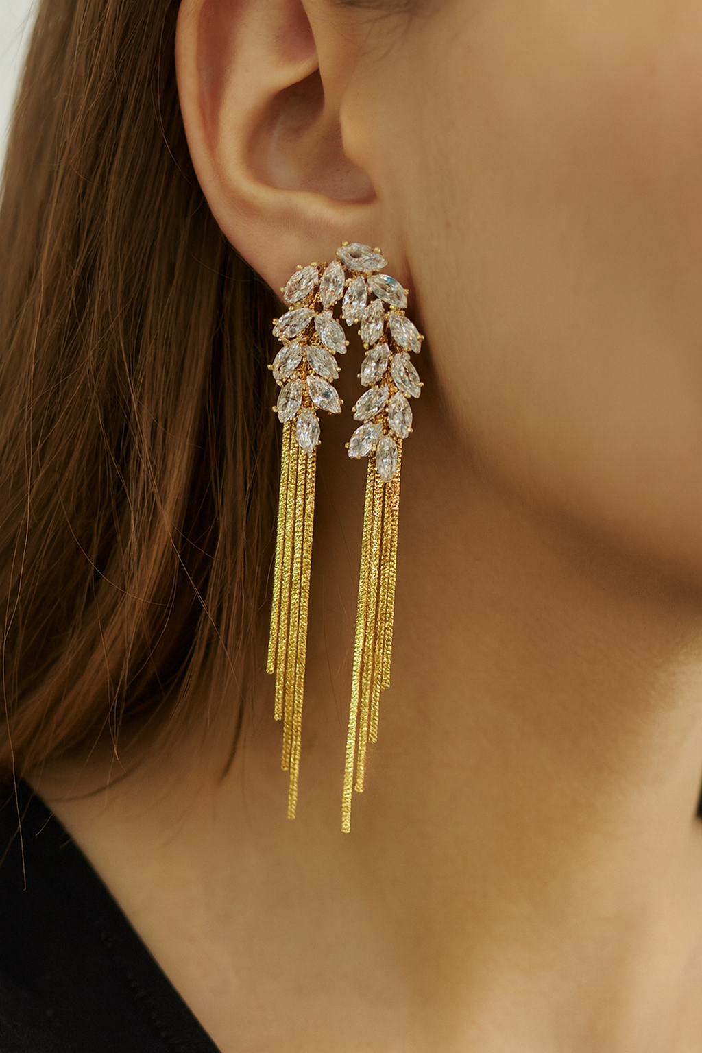 Elegant diamond leaf with tassel golden stud earring