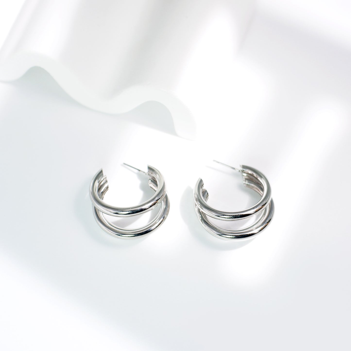 Triple silver hoop earring