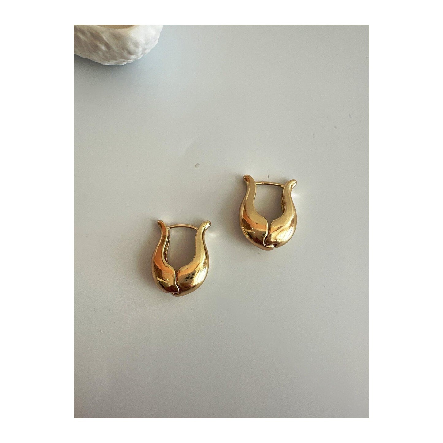U Shaped gold earring dangle
