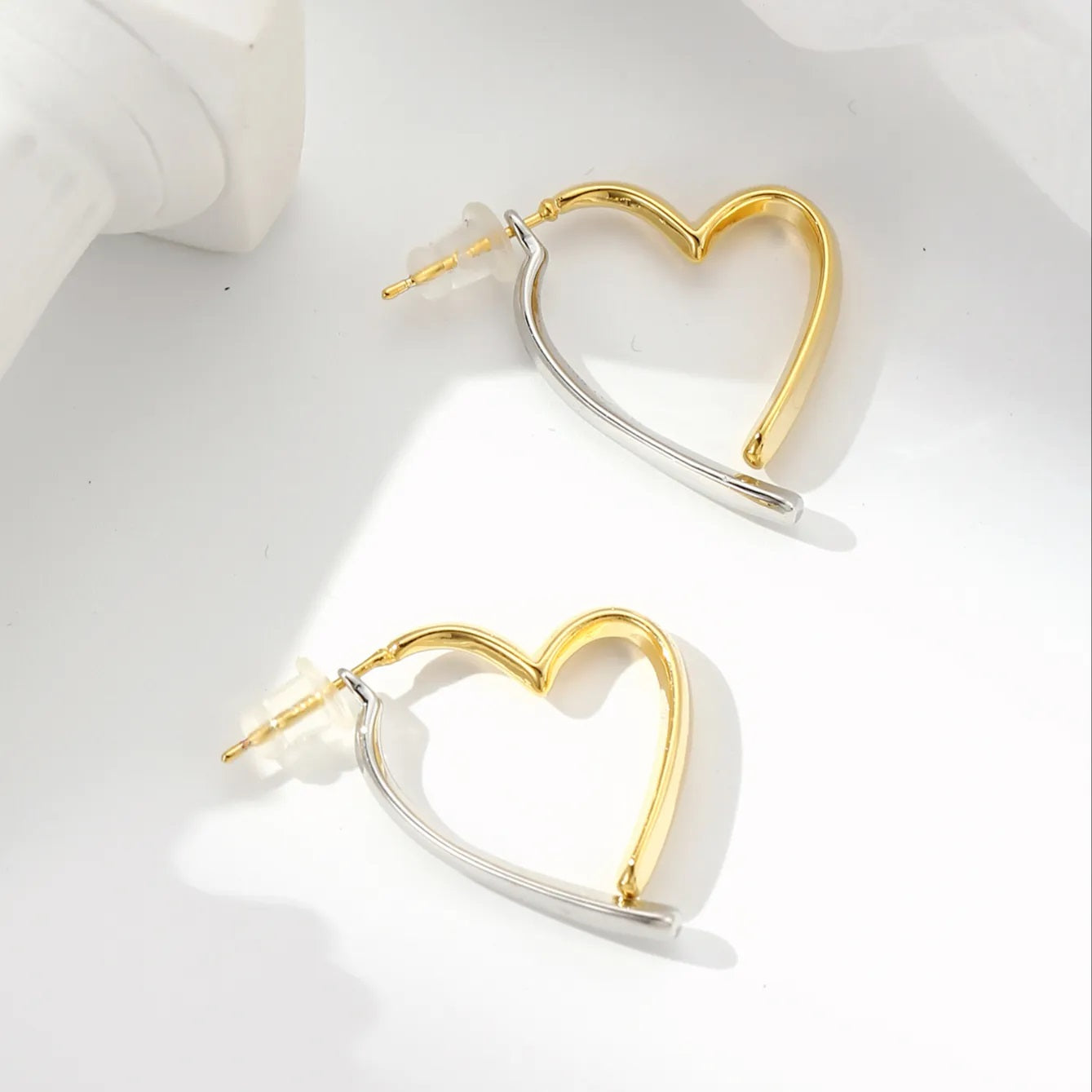 Golden and silver heart dangles