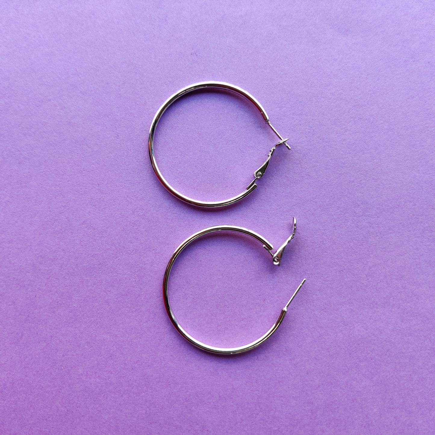 Shiny silver large hoop earring