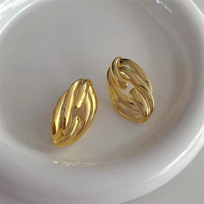 Double twisted gold fancy stud online