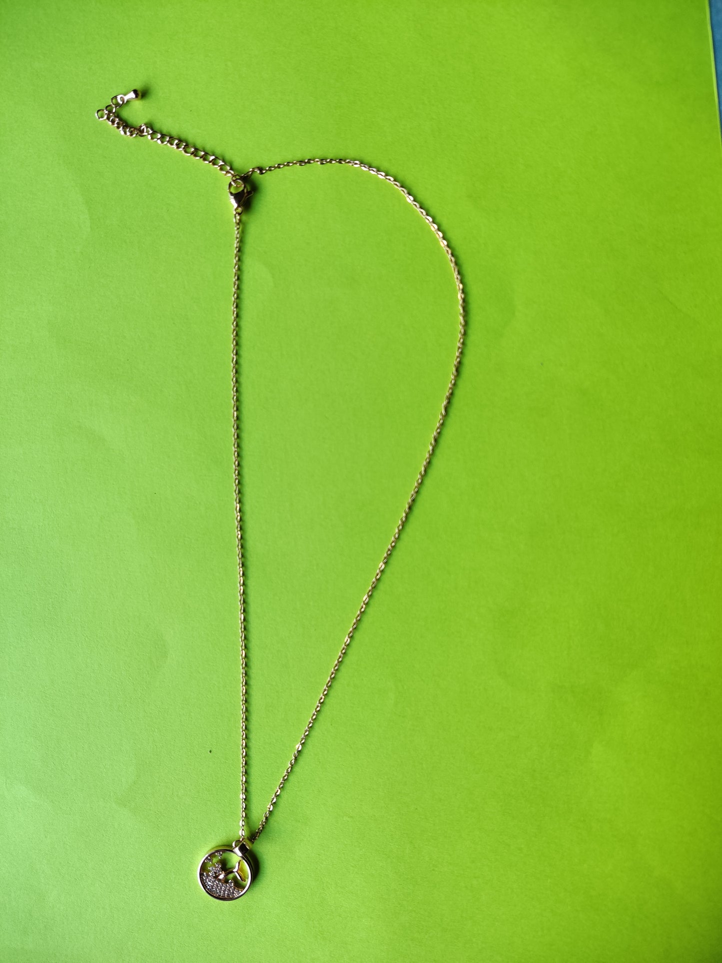 small bird pendat with rose gold chain necklace