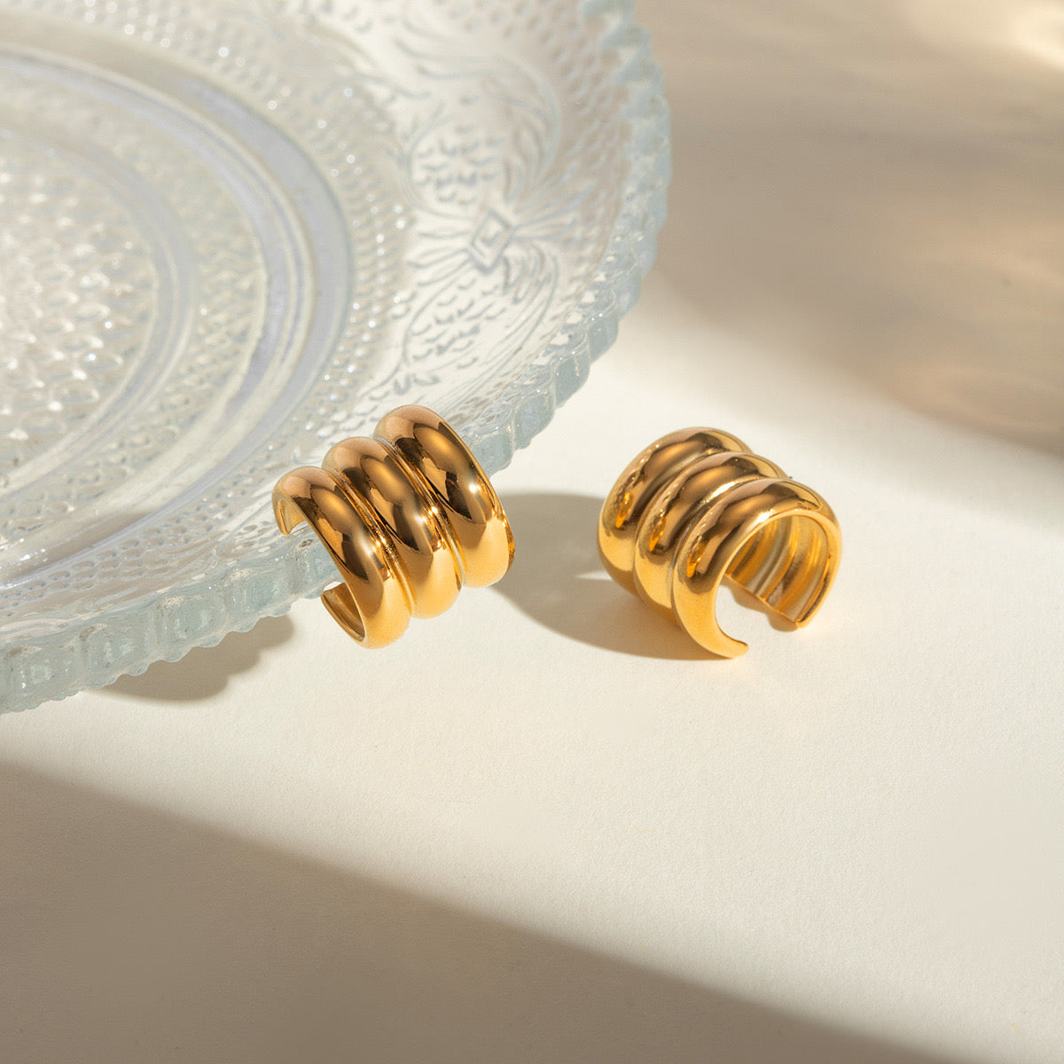 Trio gold stud earring