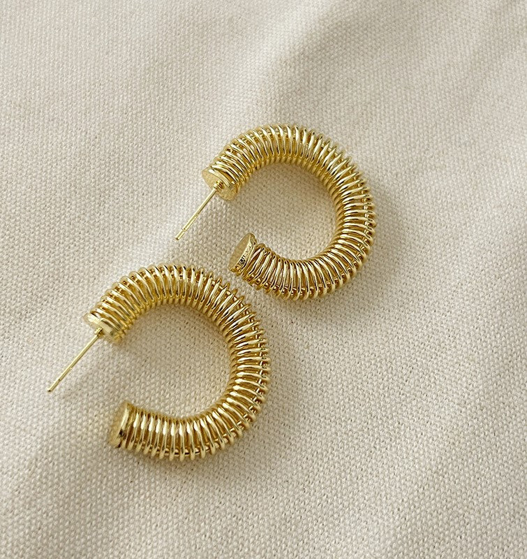Spring design gold rooted earring