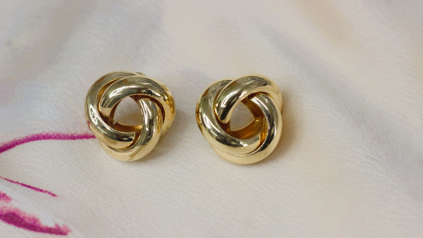 Gold twisted unique shape earring