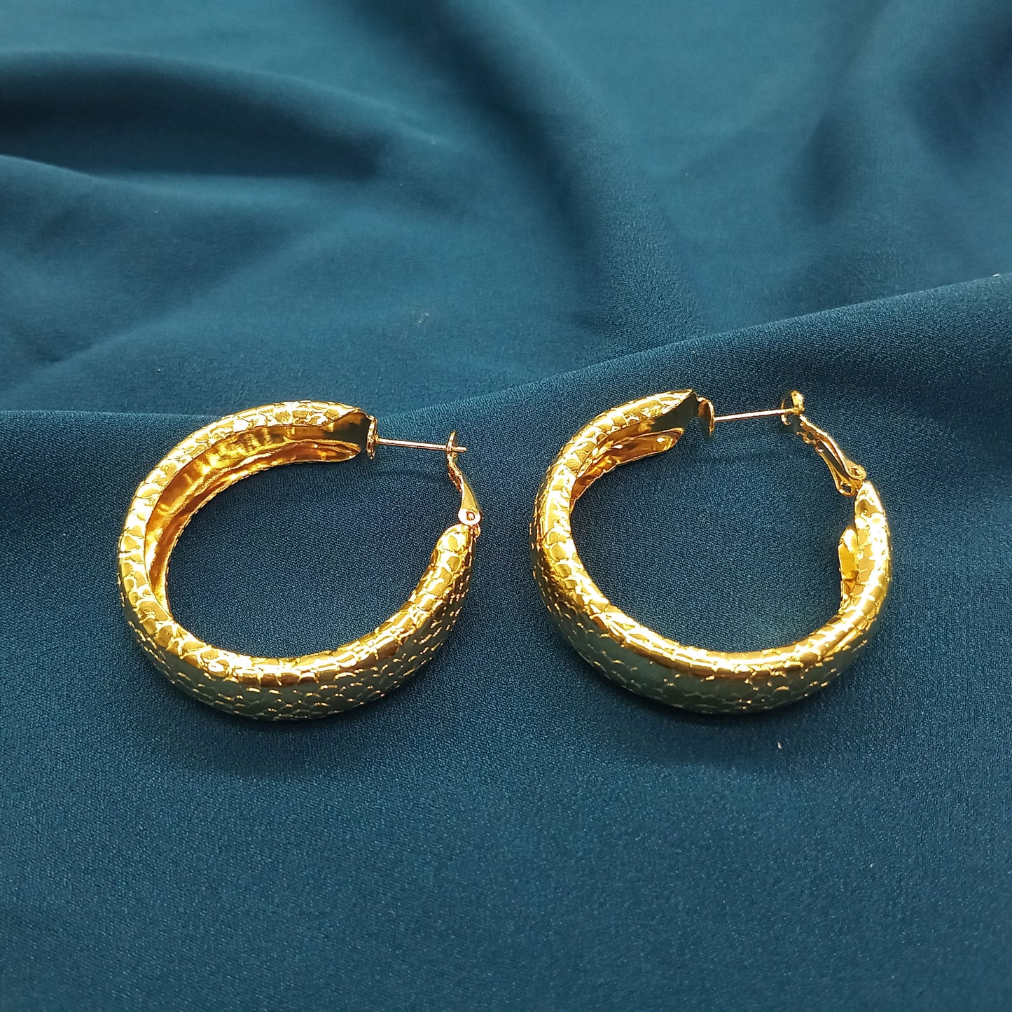 Big  circle matt gold earring