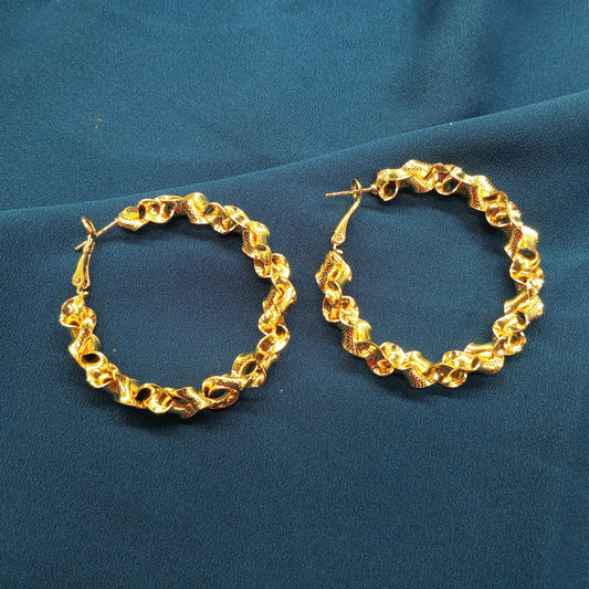 Spiral gold hoops earring