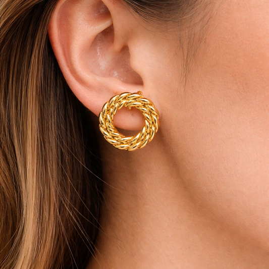 Rounded golden stud earring