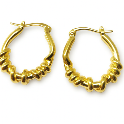 Gold twisted dangle earring