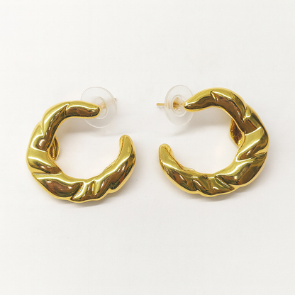 Twister gold earring