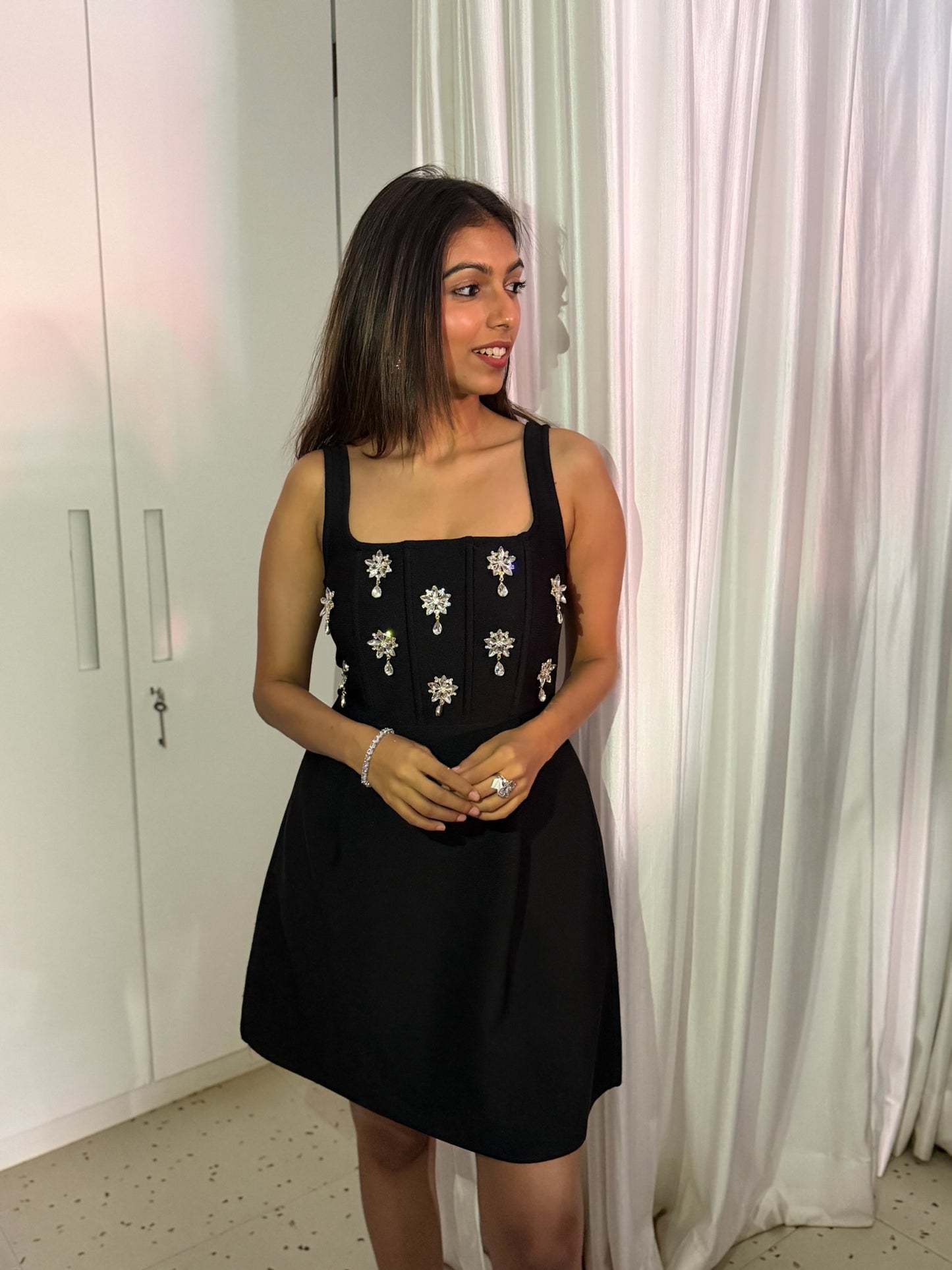 Beautiful black flayred one piece with sleev less hand