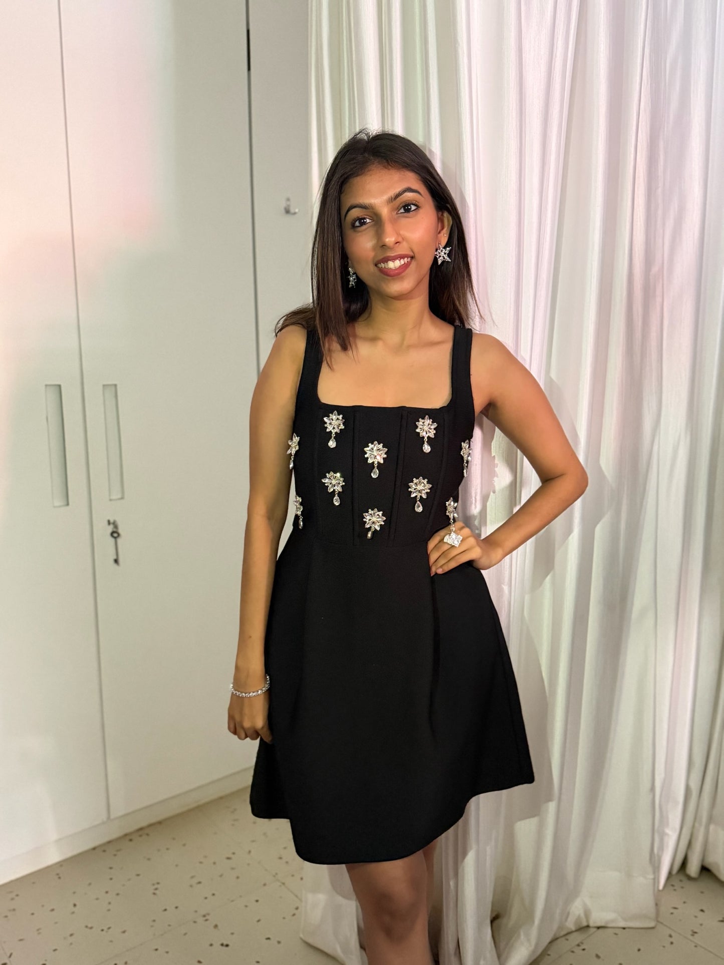 Beautiful black flayred one piece with sleev less hand