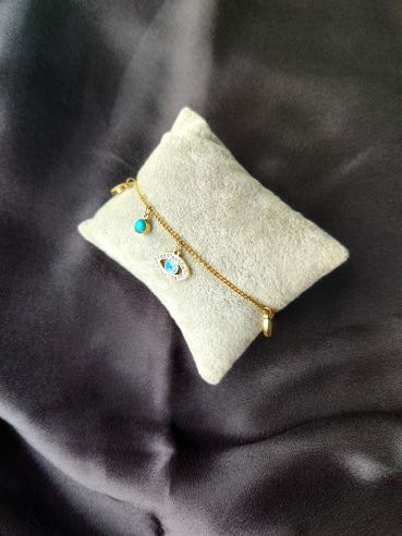 Evil eye gold bracelet whiten small stone