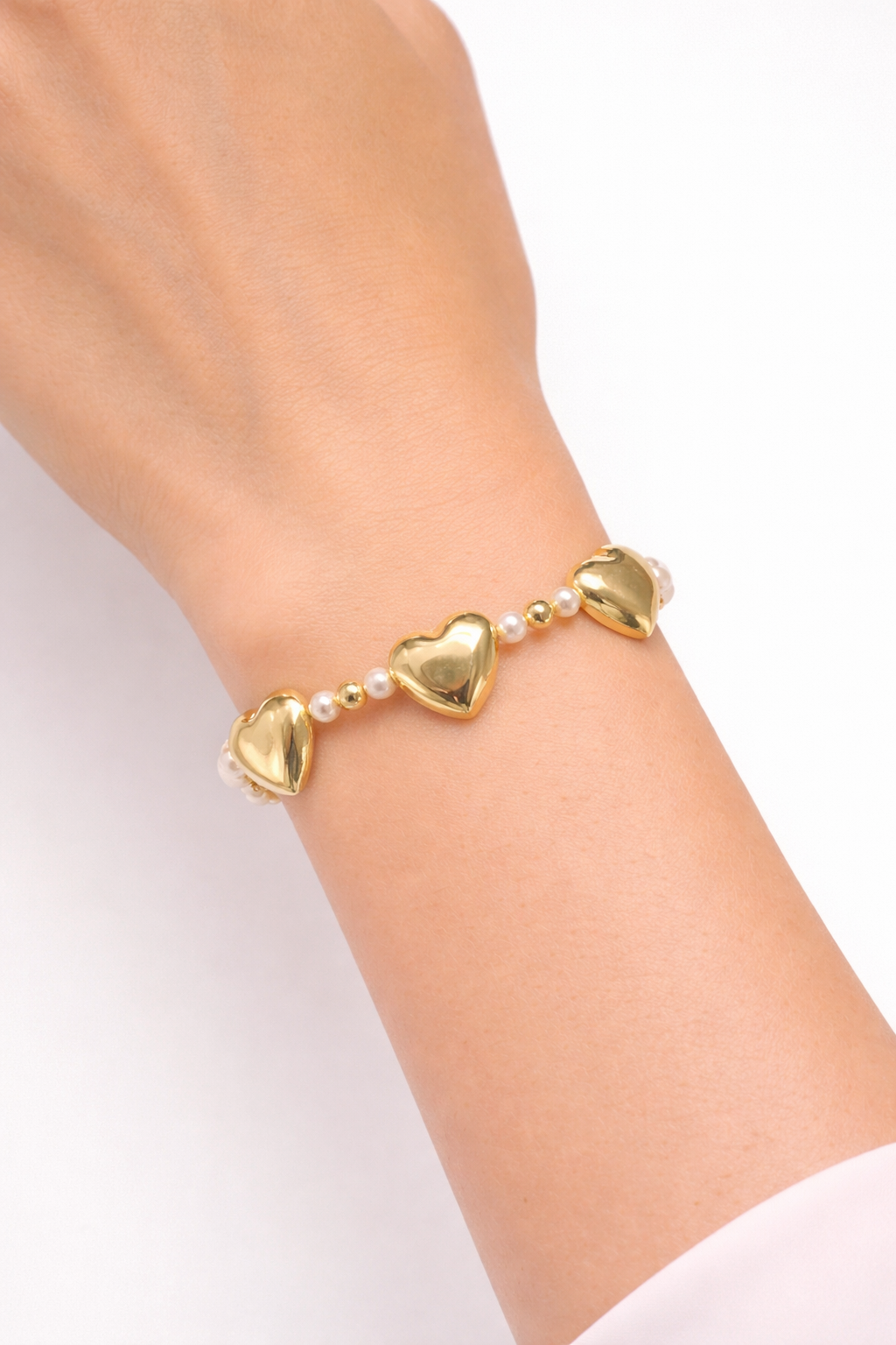 Three heart with pearl bracelet