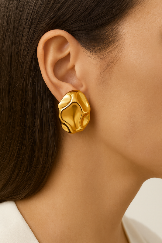 Oval style golden stud earring for women