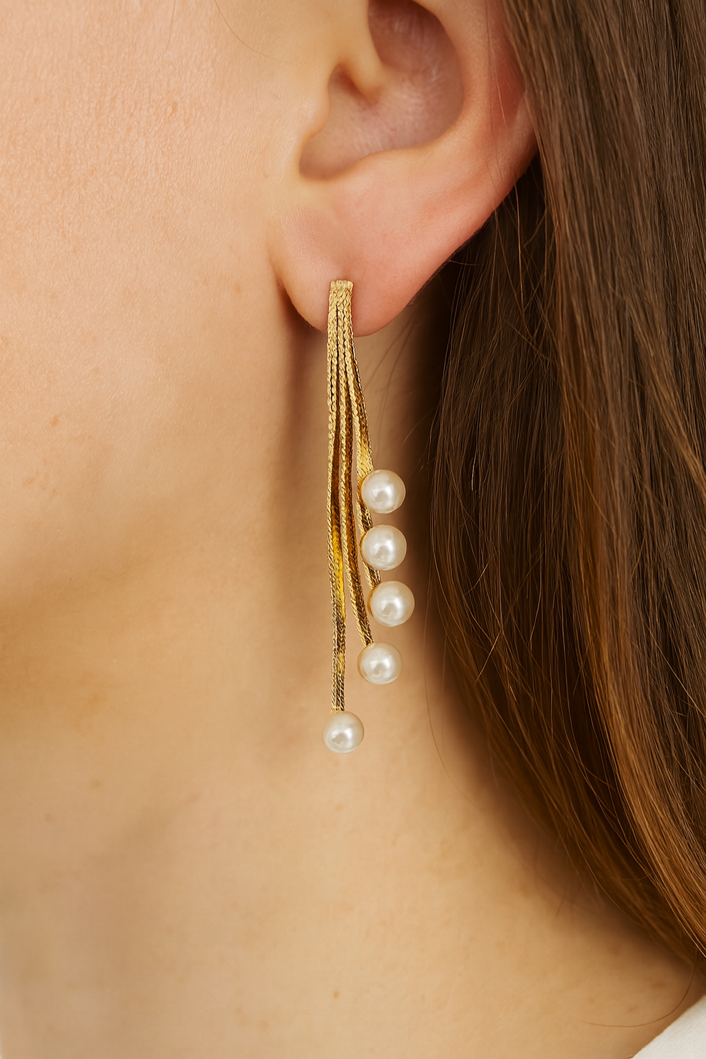 Stunning golden long tassel with pearl earring