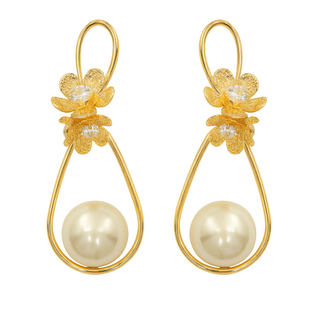 Gorgeous gold flower with large pearl drop earring