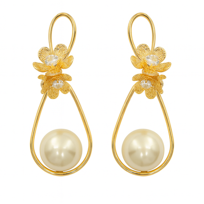 Gorgeous gold flower with large pearl drop earring