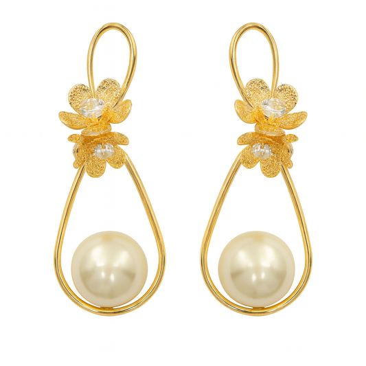 Gorgeous gold flower with large pearl drop earring