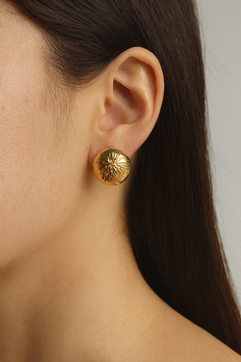 Golden coconut shell stud earring