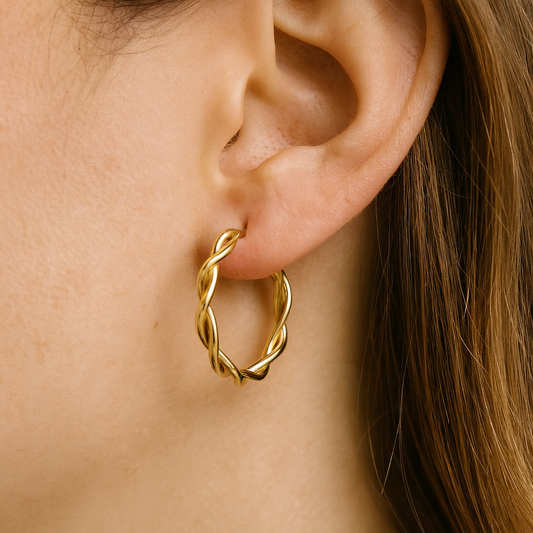 Golden dual twisted huggie earring