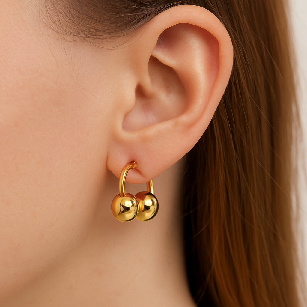 Attractive design golden huggie earring