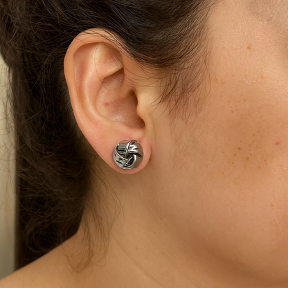 Silver knot style rounded stud earring