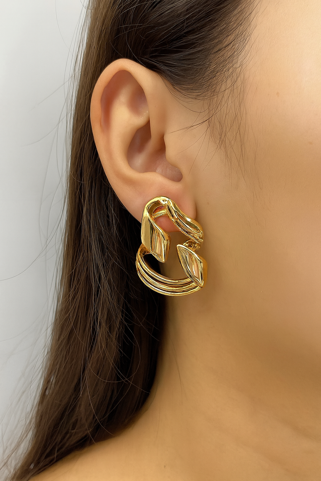 Twisted unique design glossy stud earring