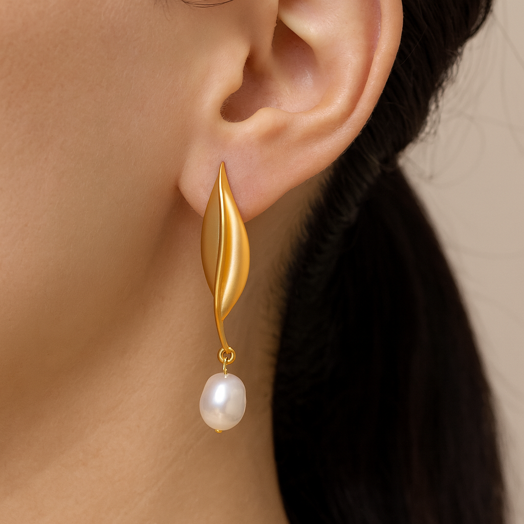Golden leaf with pearl drop stud earring
