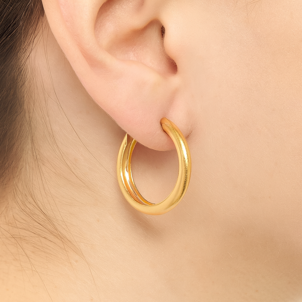 Simple golden huggie earring