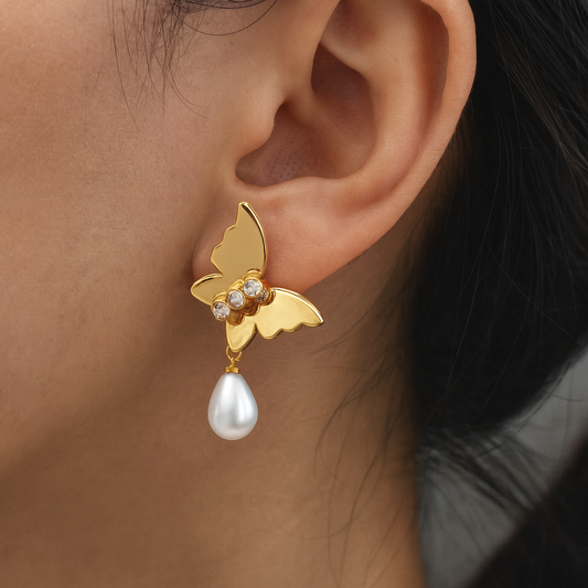 Golden butterfly with pearl drop stud earring