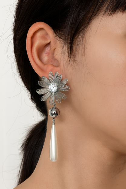 Silver sunflower with pearl drop stud earring