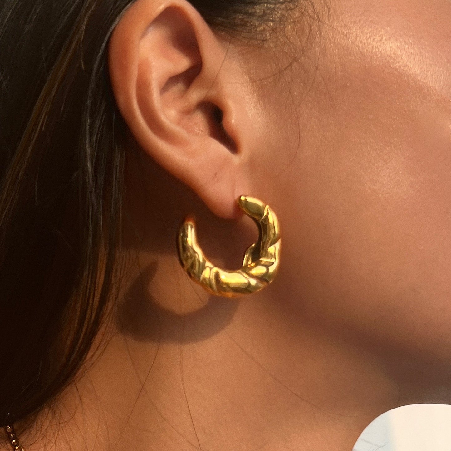 Twister gold earring