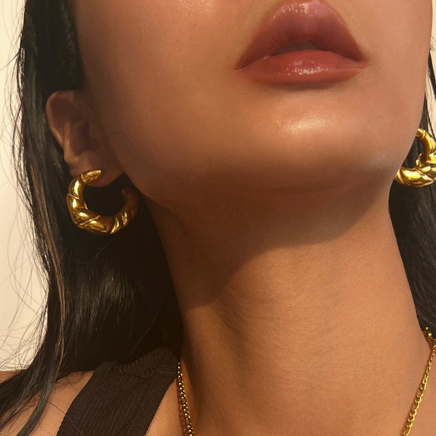 Twister gold earring