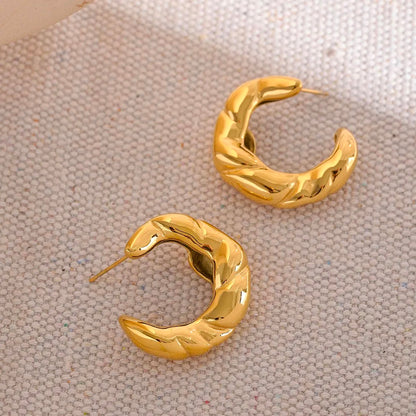 Twister gold earring